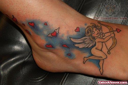 Cupid Large Tattoo On Foot