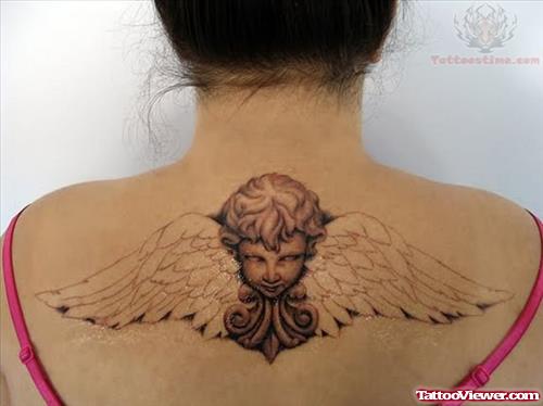 Cupid Cherub Tattoo On Upper Back