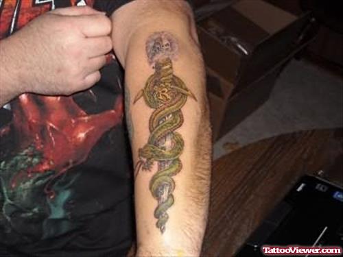 Snake Dagger Tattoo On Arm
