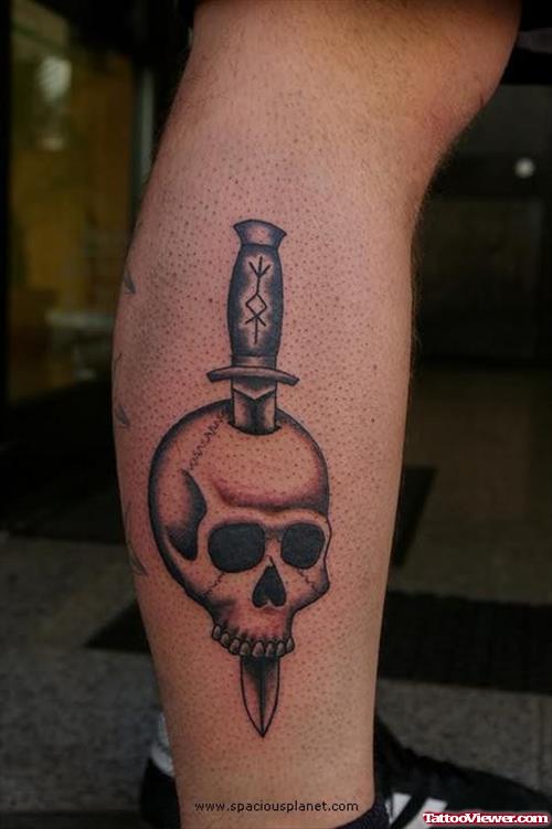 Skull And dagger Tattoo On Leg