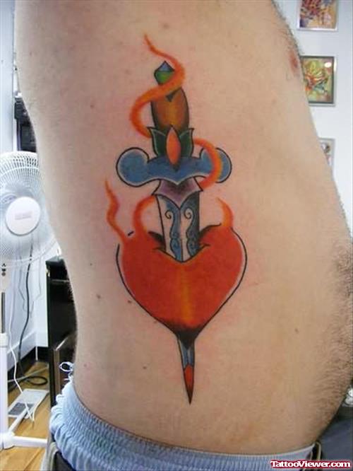Heart Dagger Flame Tattoo On Rib