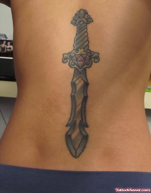 Dagger Tattoo On Lower Back