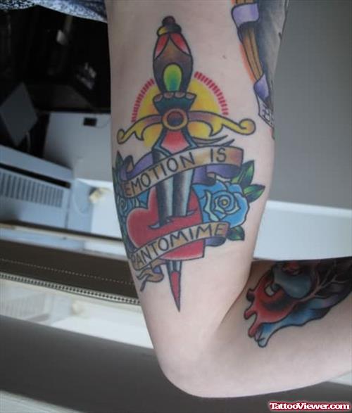 Emotion Dagger Tattoo On Muscles