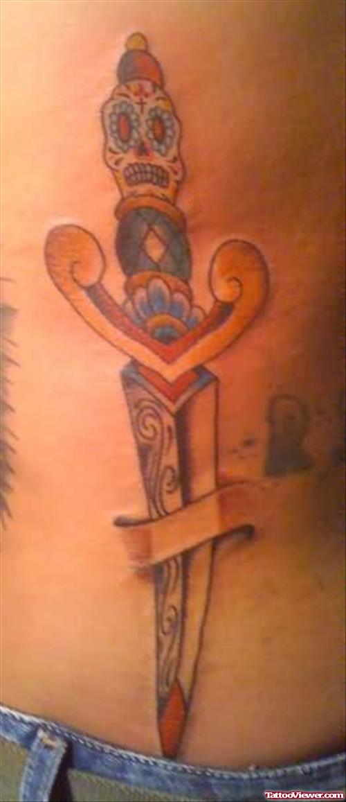 Dagger Tattoo On Rib