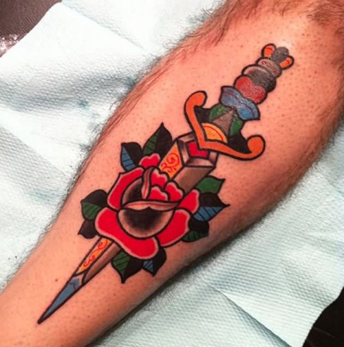 Red Flower And Dagger Tattoo On Leg