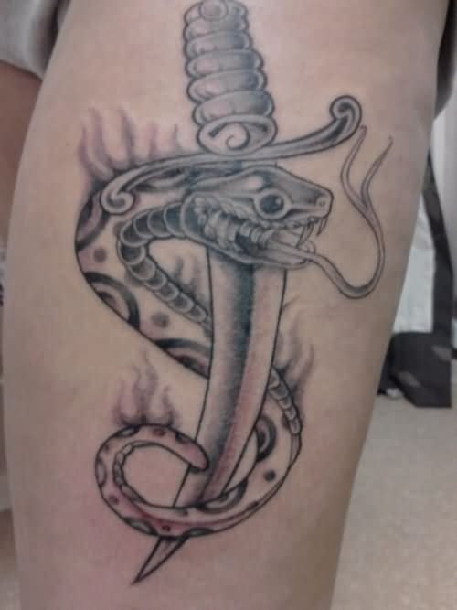 Grey Ink Snake And Dagger Tattoo On Sleeve