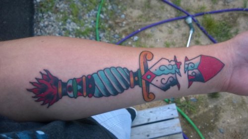 Dagger Tattoo On Left Forearm