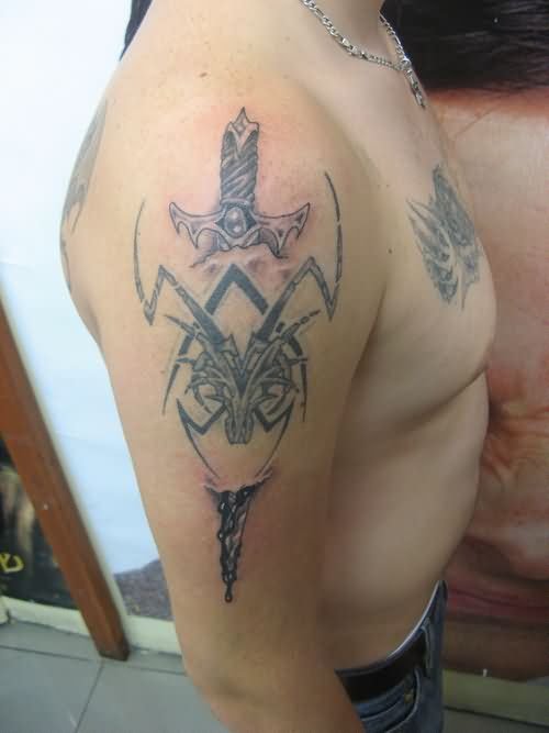 Man Right Half Sleeve Tribal And Dagger Tattoo