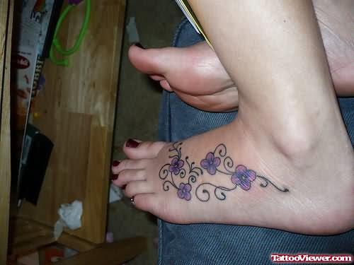 Daisy Flower Tattoo On Feet