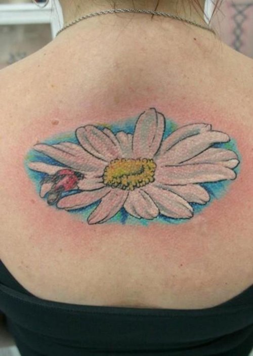 White Daisy Flower Tattoo On Upper Back