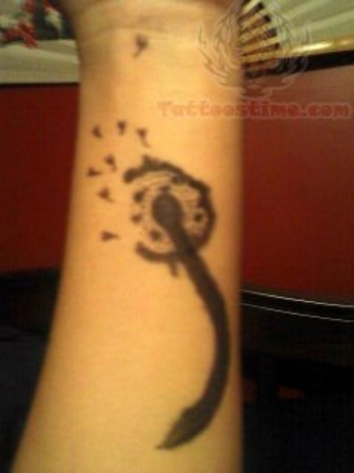 Dark ink Dandelion Tattoo On Arm