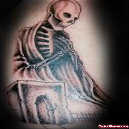Sitting skull Tattoo On Body