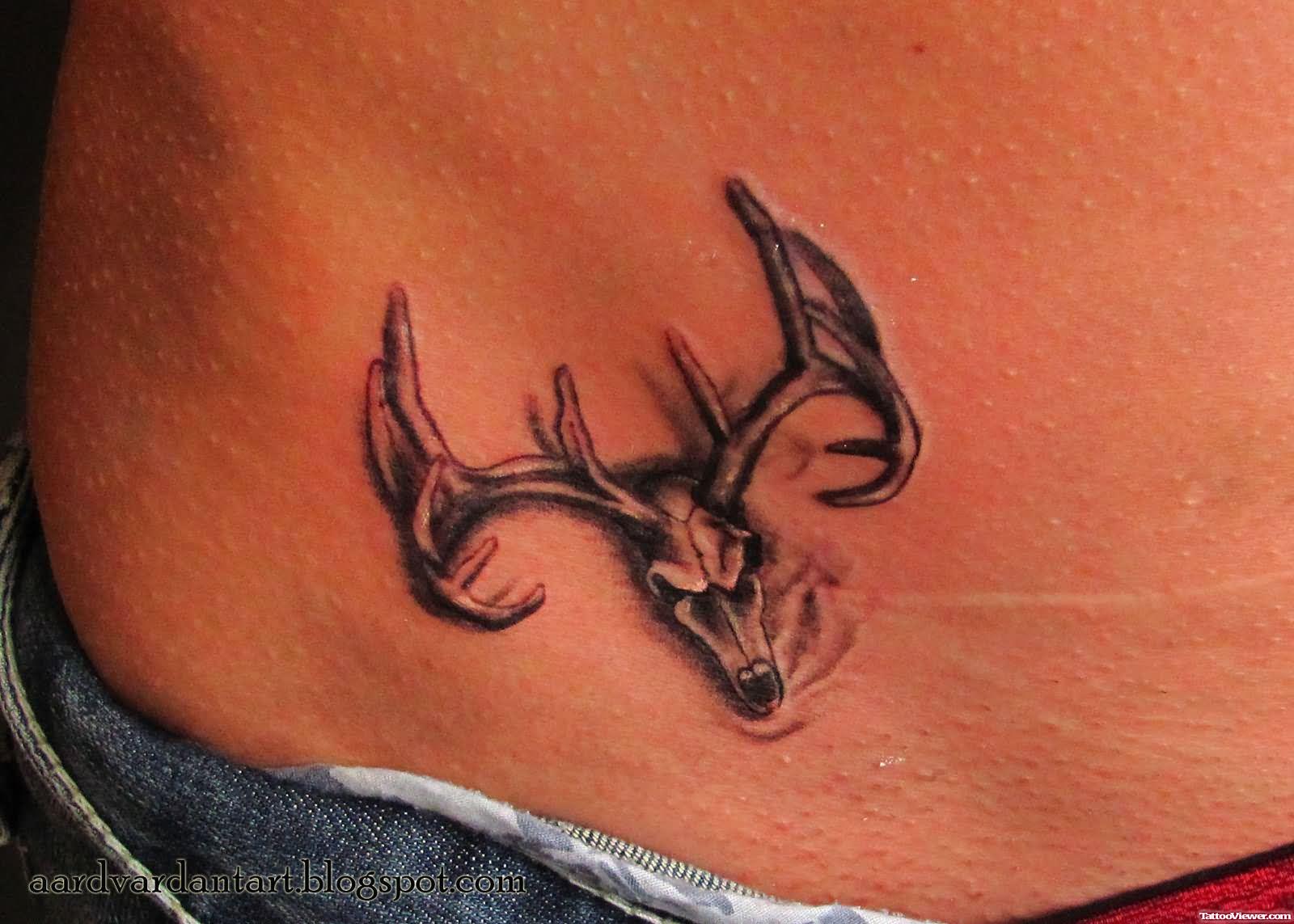 Deer Skull Tattoo On Lower Back Tattoo Viewer Com
