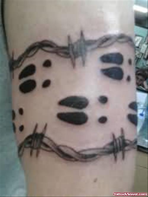 Deer Tracks and Barbed Wire tattoo