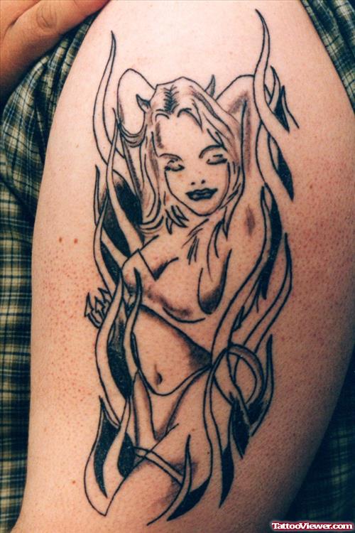 Tribal And Devil Tattoo On Left Half Sleeve