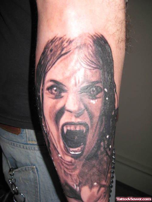 Devil Girl Head Tattoo On Right Sleeve