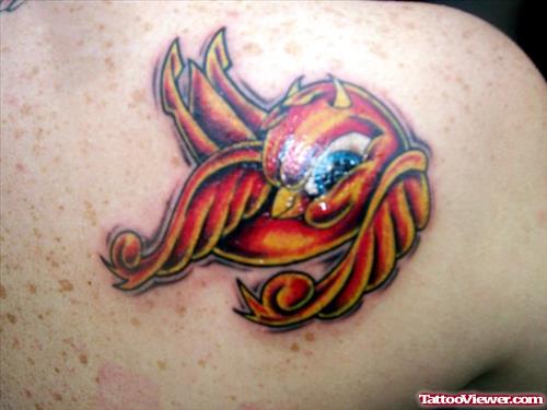 Red Ink Devil Bird Tattoo On Back Shoulder