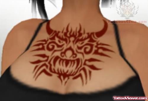 Tribal Red Devil Tattoo On Girl Chest