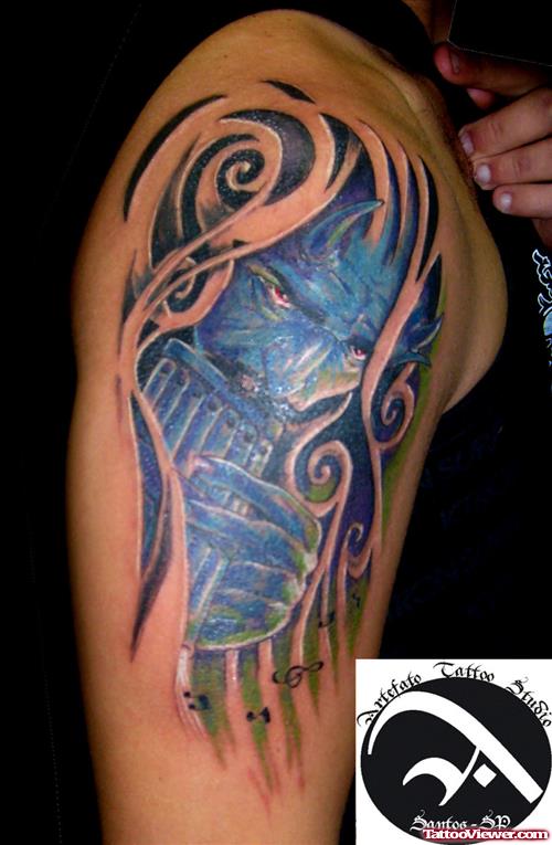Tribal And Devil Tattoo On Right Half Sleeve