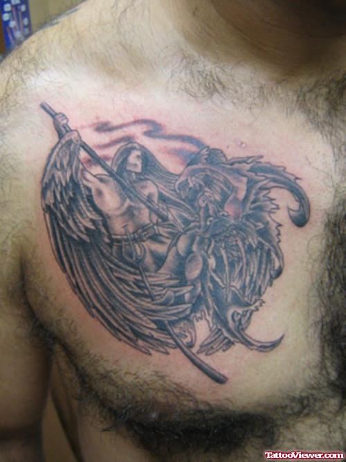 Grey Ink Angel And Devil Fight Tattoo On Man Chest