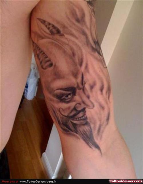Devil Face Tattoo On Muscles