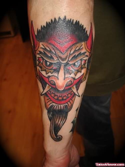 Ugly Devil Face Tattoo Design