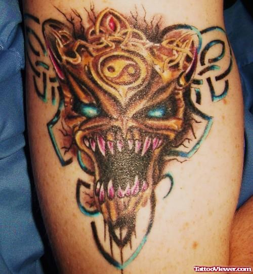 Tribal And Devil Skull Tattoo On Half Sleeve