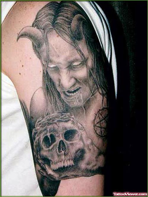 Skull And Devil Tattoo On Man Left Half Sleeve