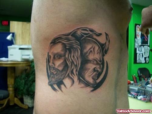 Jesus n Devil Face Tattoo On Rib Side