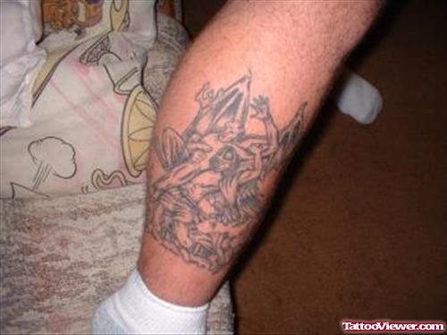 Grey Ink Devil Tattoo On Right Leg