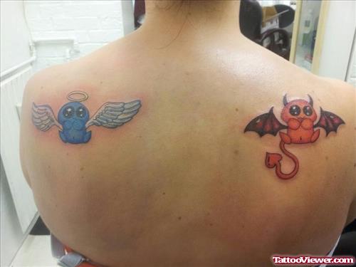 The Angel n  Devil Tattoo Design On Upper Back