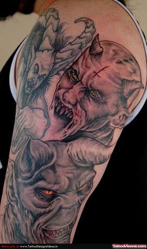 Scary Devil Tattoo On Left Half Sleeve