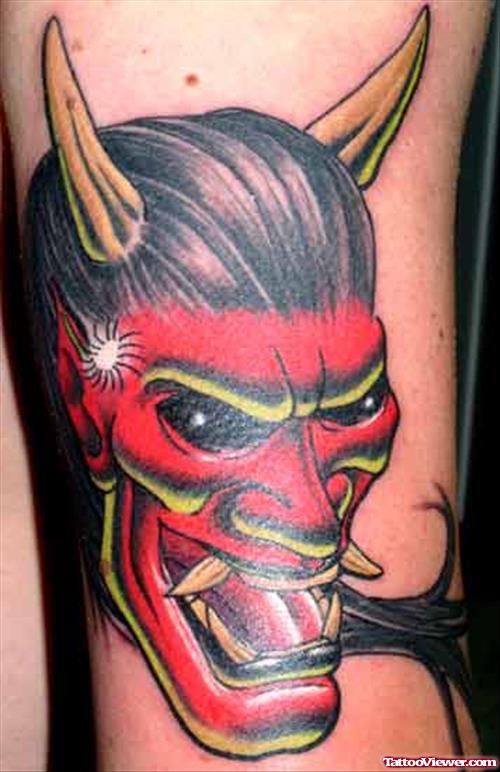 Red Ink Devil Face Tattoo Design