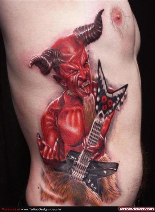 Red Devil With Guitar Tattoo On Ribs
