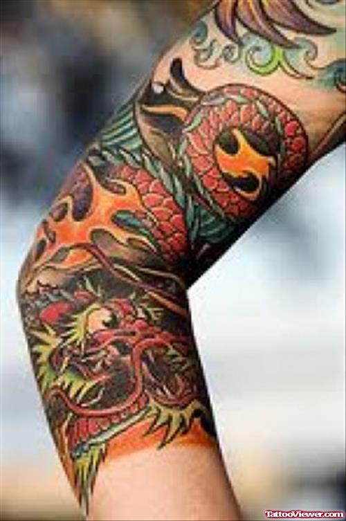 Colored Devil Dragon Tattoo On Sleeve