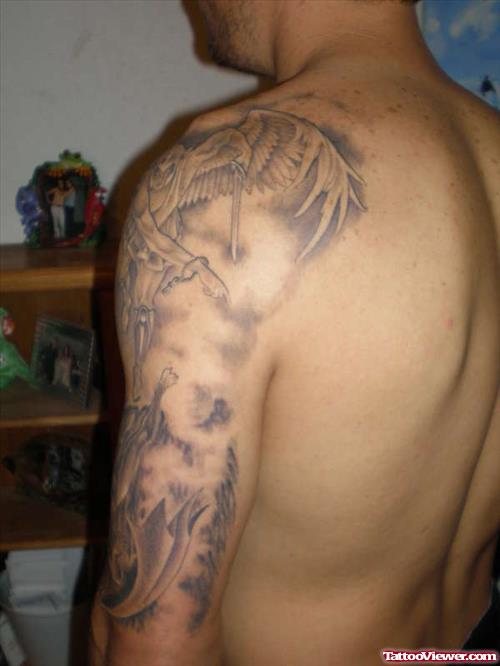 Beautiful Grey Ink Devil Tattoo On Man Left Sleeve