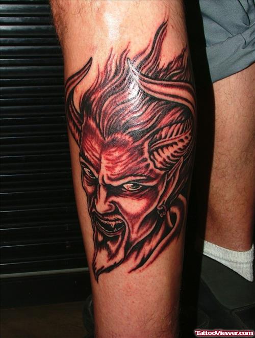 Grey Ink Devil Tattoo On Leh