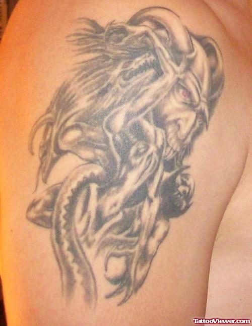Grey Ink Devil Tattoo On Man Right Shoulder