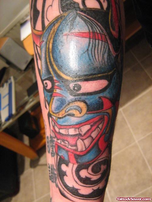 Awesome Colored Devil Head Tattoo On Sleeve