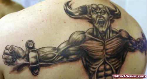 Grey Ink Devil Tattoo