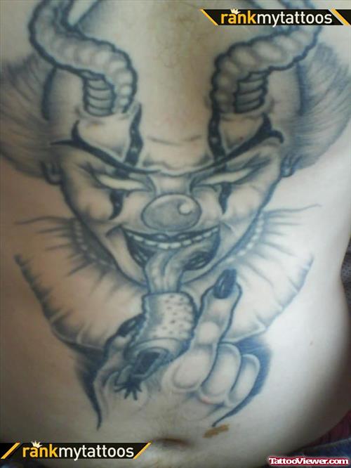 Grey Ink Devil Clown Tattoo On Chest