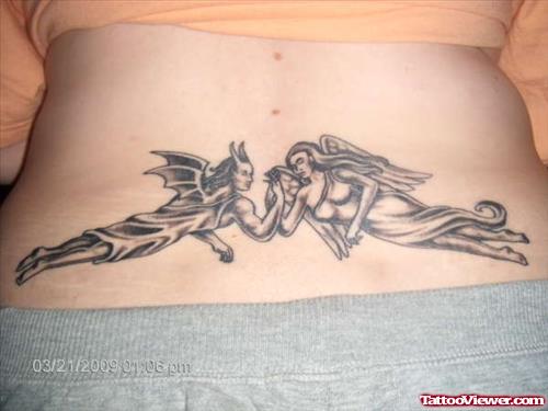 Angel Vs Devil Tattoo On Lower Back