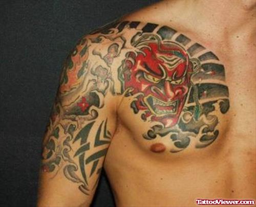 Devil Mask Tattoo Design On Chest