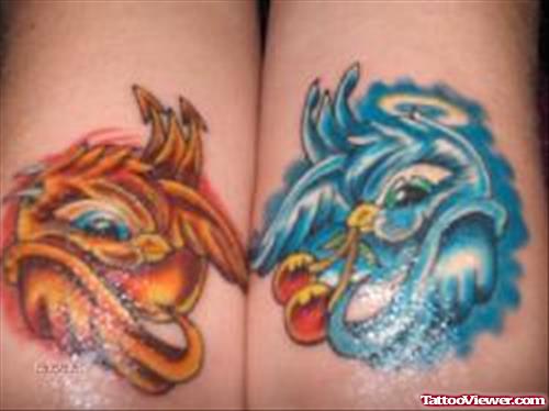 Colored Angel And Devil Birds Tattoos