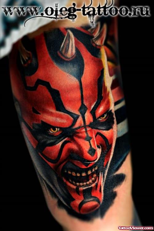Colored Ink Devil Head Tattoo On Half Sleeve
