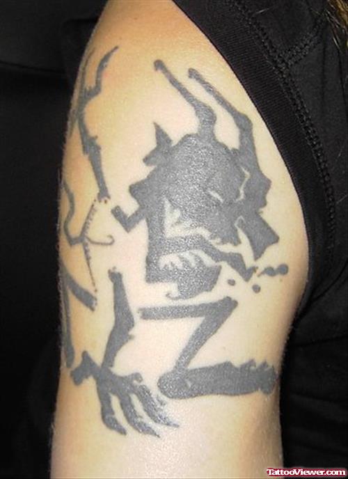 Black Ink Sacred Devil Tattoo
