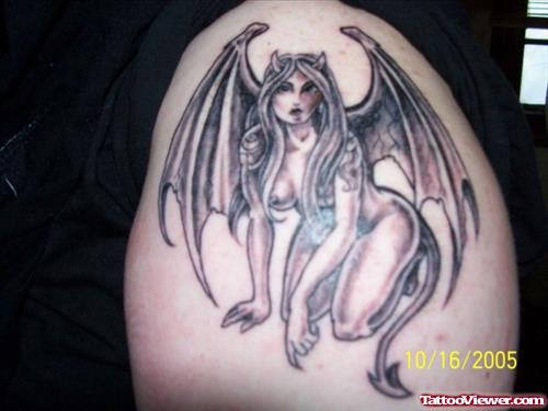 A Devil Woman With Wings Tattoo On Shoulder
