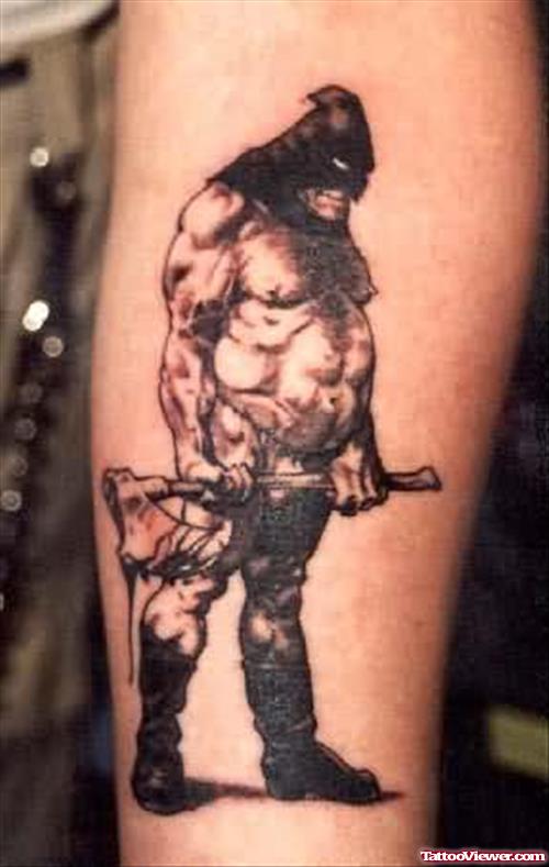 Devil With Axe Tattoo On Arm