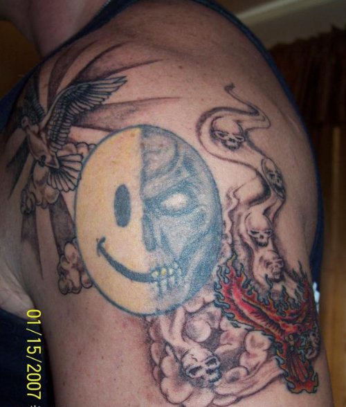 Flying Dove And Devil Tattoo On Left Shoulder