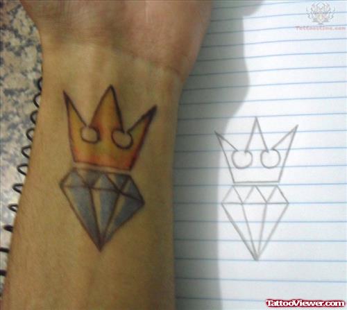 Diamond With Crown Tattoo On Wrist